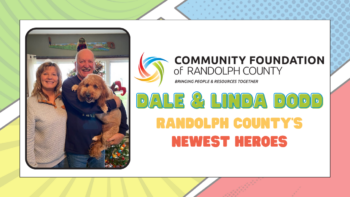 Image of Dale and Linda Dodd, newly recognized Randolph County Heroes, with their dog, Maverick.